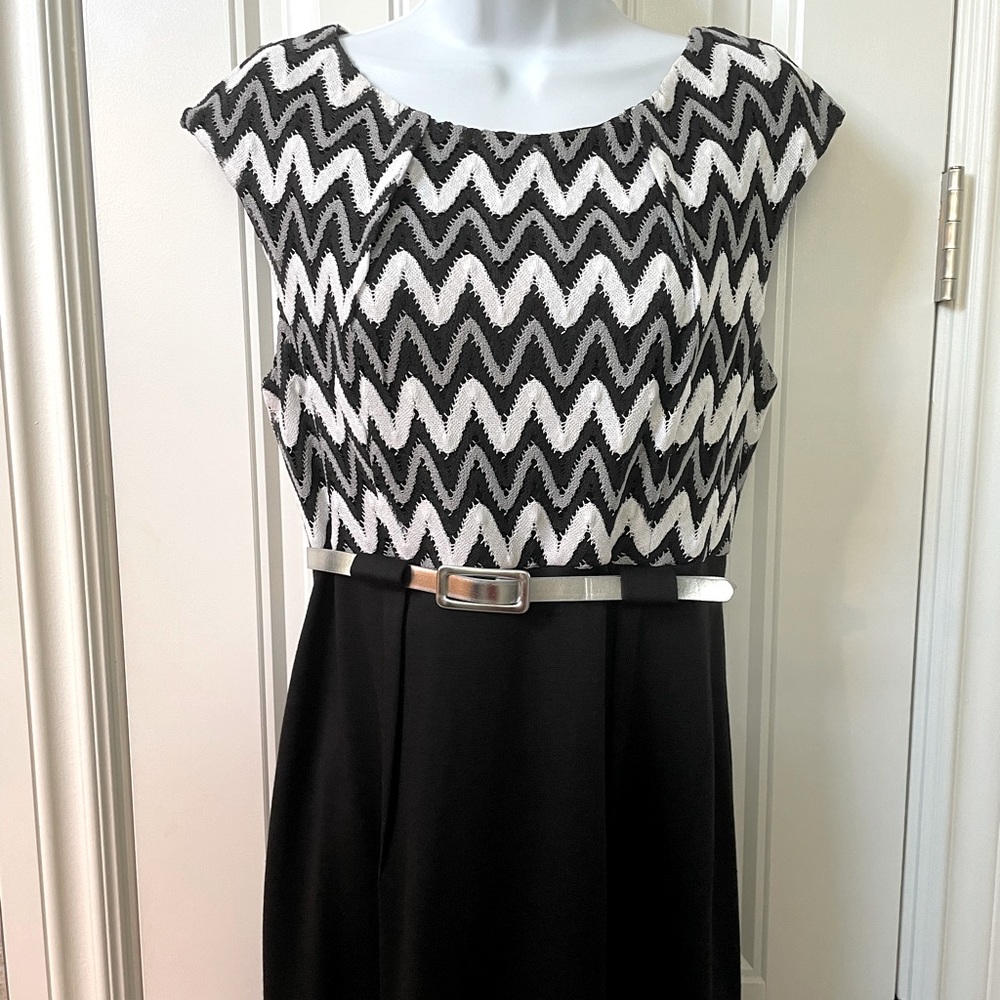 Work dress in black/white/gray with silver belt.